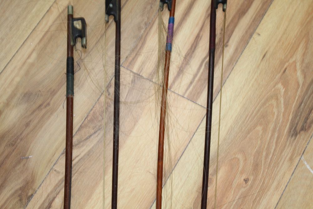 A Chinese violin and four bows